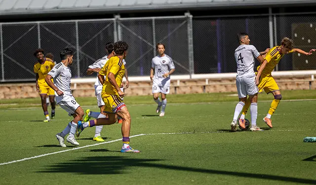 Jose Segura wearing #9 for Orlando City SC Academy U19 in a friendly against the Top Team men’s team, photo 1